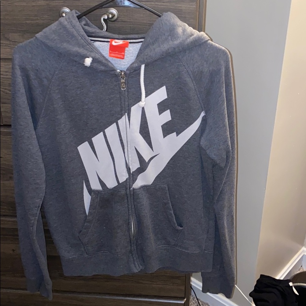 Woman’s small gray Nike sweat shirt with hood